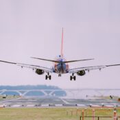 Airplane preparing for landing at the airport | SUPERPOBYT World